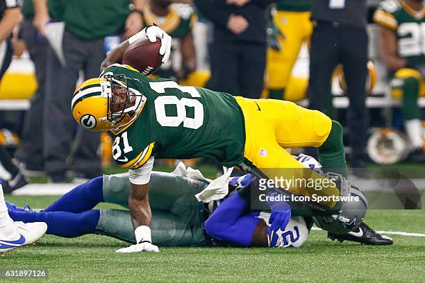 Green Bay Packers wide receiver Geronimo Allison is tackled by Dallas Cowboys cornerback Morris Claiborne during the NFC Divisional Playoff game...