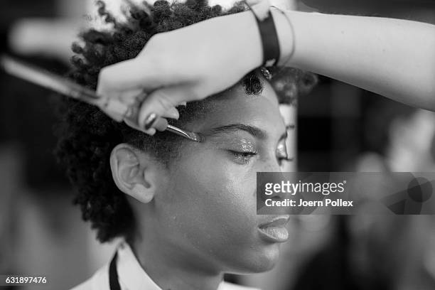 Model is seen backstage ahead of the Hien Le show during the Mercedes-Benz Fashion Week Berlin A/W 2017 at Kaufhaus Jandorf on January 17, 2017 in...