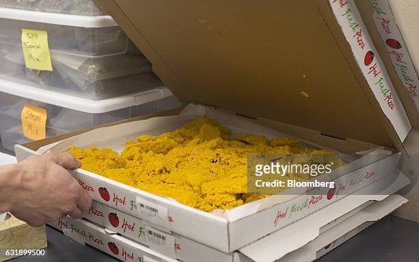 Marijuana wax is stored in pizza boxes at the Smokey Point Productions facility in Arlington, Washington, U.S., on Thursday, Jan. 12, 2017. The...