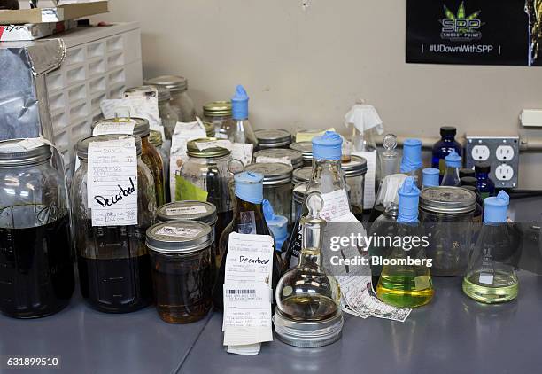 Marijuana concentrates sit in jars at the Smokey Point Productions facility in Arlington, Washington, U.S., on Thursday, Jan. 12, 2017. The...