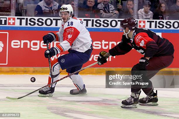 Richard Nedomlel of Sparta Prague challenges Dennis Everberg of Vaxjo during the Champions Hockey League Semi Final match between Sparta Prague and...