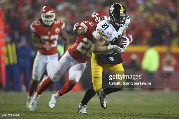 Kansas City Chiefs cornerback Steven Nelson dives to tackle Pittsburgh Steelers tight end Jesse James in the fourth quarter of the AFC Divisional...