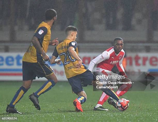 Fleetwood Town's Amari'i Bell battles with Bristol City's Jamie Paterson during the Emirates FA Cup Third Round Replay match between Fleetwood Town...