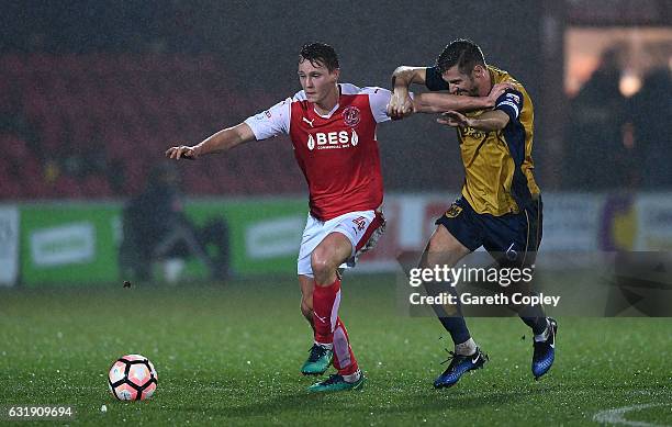 Eggert Jonsson of Fleetwood is tackled by Gary O'Neil of Bristol City during The Emirates FA Cup Third Round Replay between Fleetwood Town and...