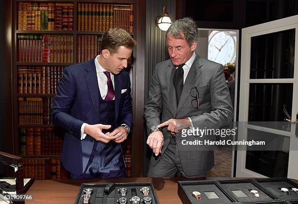 Christoph Grainger-Herr and Tim Jefferies visit the IWC booth during the launch of the Da Vinci Novelties from the Swiss luxury watch manufacturer...