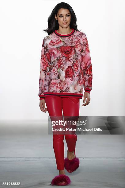 Rebecca Mir walks the runway at the Riani show during the Mercedes-Benz Fashion Week Berlin A/W 2017 at Kaufhaus Jandorf on January 17, 2017 in...