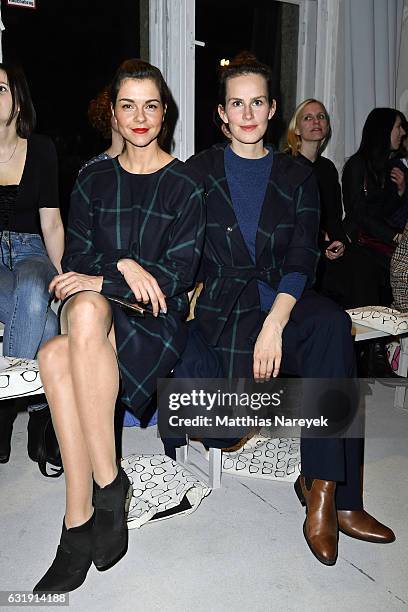 Susan Hoecke and Saralisa Volm attend the Hien Le show during the Mercedes-Benz Fashion Week Berlin A/W 2017 at Kaufhaus Jandorf on January 17, 2017...