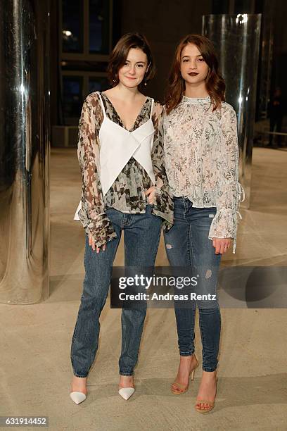 Lea van Acken and Lisa-Marie Koroll attend the Malaikaraiss defile during the Der Berliner Mode Salon A/W 2017 at Kronprinzenpalais on January 17,...