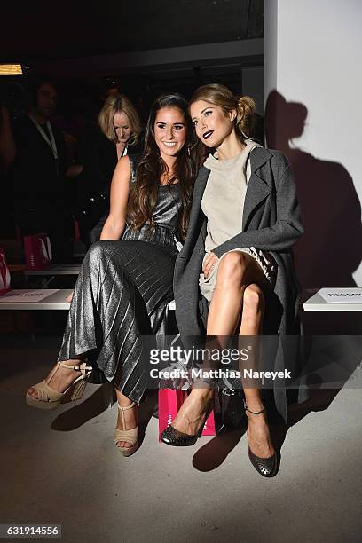 Sarah Lombardi and Cathy Hummels attend the Riani show during the Mercedes-Benz Fashion Week Berlin A/W 2017 at Kaufhaus Jandorf on January 17, 2017...