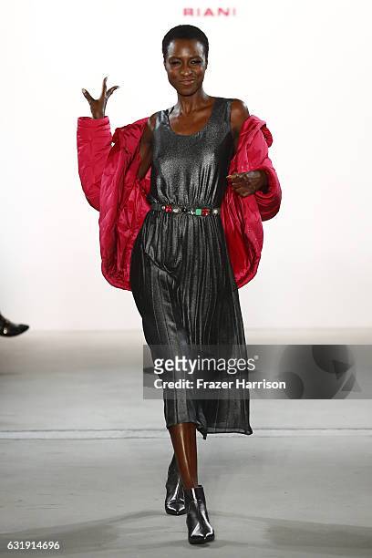 Model walks the runway at the Riani show during the Mercedes-Benz Fashion Week Berlin A/W 2017 at Kaufhaus Jandorf on January 17, 2017 in Berlin,...