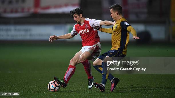 Jack Sowerby of Fleetwood holds off Joe Bryan of Bristol City during The Emirates FA Cup Third Round Replay between Fleetwood Town and Bristol City...