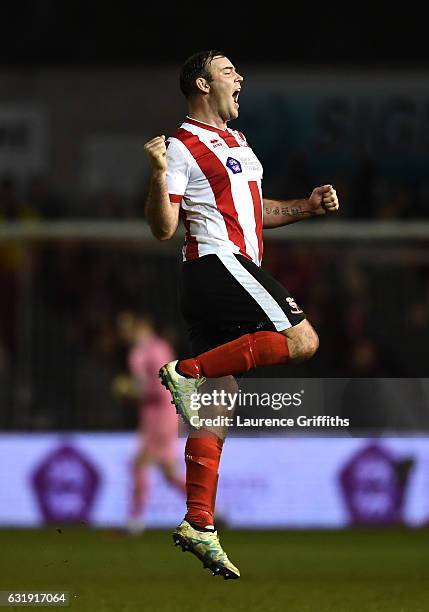 Matt Rhead of Lincoln City celebrates during the Emirates FA Cup third round replay between Lincoln City and Ipswich Town at Sincil Bank Stadium on...