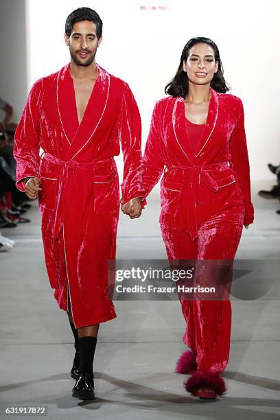 Sami Slimani and Lamiya Slimani walks the runway at the Riani show during the Mercedes-Benz Fashion Week Berlin A/W 2017 at Kaufhaus Jandorf on...