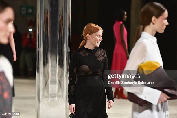 Designer Malaika Raiss acknowledges the applause of the audience at the Malaikaraiss show during the Mercedes-Benz Fashion Week Berlin A/W 2017 at...