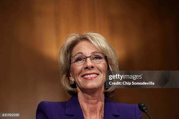 Betsy DeVos, President-elect Donald Trump's pick to be the next Secretary of Education, testifies during her confirmation hearing before the Senate...