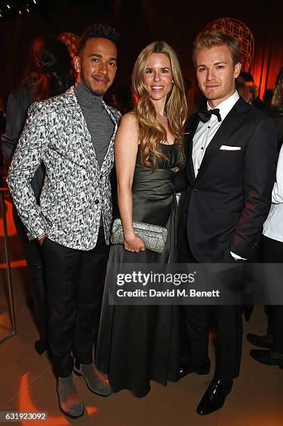 Lewis Hamilton, Vivian Rosberg and Nico Rosberg attend the IWC Schaffhausen "Decoding the Beauty of Time" Gala Dinner during the launch of the Da...