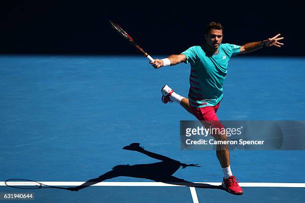 Stan Wawrinka of Switzerland plays a backhand in his second round match against Steve Johnson of the United States on day three of the 2017...