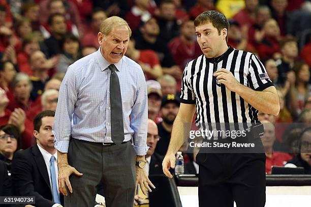 Head coach John Beilein of the Michigan Wolverines reacts to an official's call during a game against the Wisconsin Badgers at the Kohl Center on...