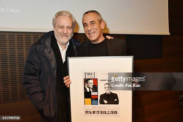 Yves Bigot and TV presenter Thierry Ardisson attend the Philippe Caloni 2016 Award Ceremony for the Best Interviewer Hosted by the SCAM at The SCAM...
