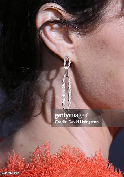 Actress Carla Gugino, earring detail, attends the premiere of STX Entertainment's "The Space Between Us" at ArcLight Hollywood on January 17, 2017 in...