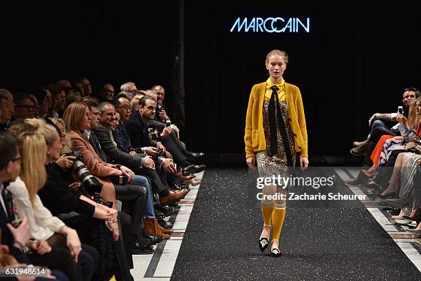 Model walks the runway at the Marc Cain fashion show A/W 2017 on January 17, 2017 in Berlin, Germany.