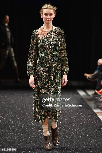 Model walks the runway at the Marc Cain fashion show A/W 2017 on January 17, 2017 in Berlin, Germany.