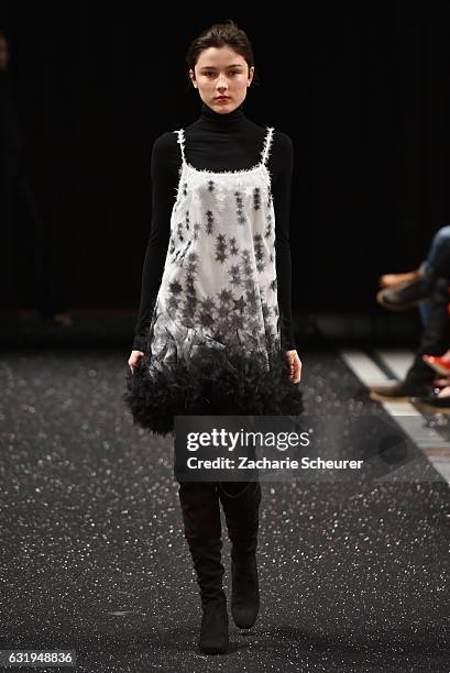 Model walks the runway at the Marc Cain fashion show A/W 2017 on January 17, 2017 in Berlin, Germany.