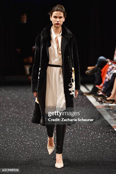 Model walks the runway at the Marc Cain fashion show A/W 2017 on January 17, 2017 in Berlin, Germany.