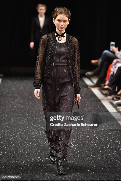 Model walks the runway at the Marc Cain fashion show A/W 2017 on January 17, 2017 in Berlin, Germany.