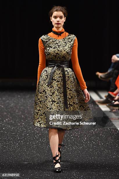 Model walks the runway at the Marc Cain fashion show A/W 2017 on January 17, 2017 in Berlin, Germany.