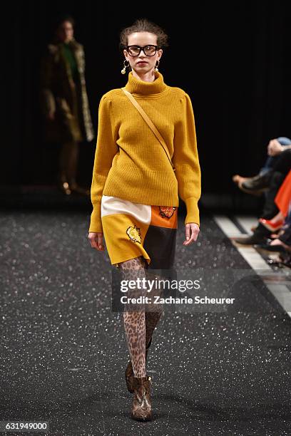 Model walks the runway at the Marc Cain fashion show A/W 2017 on January 17, 2017 in Berlin, Germany.