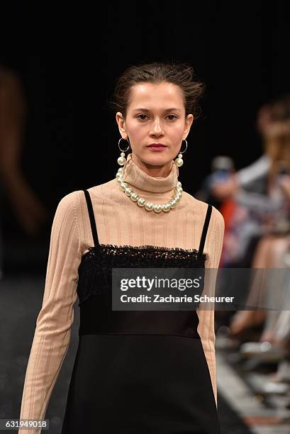 Model walks the runway at the Marc Cain fashion show A/W 2017 on January 17, 2017 in Berlin, Germany.