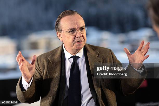 Stuart Gulliver, chief executive officer of HSBC Holdings Plc, gestures as he speaks during a Bloomberg Television interview during the World...