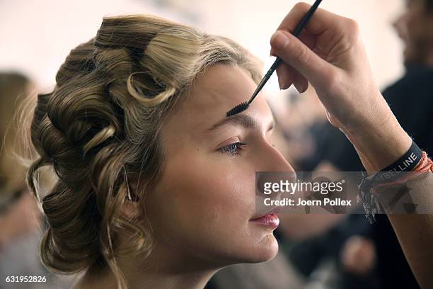 Model is seen backstage ahead of the Sportalm show during the Mercedes-Benz Fashion Week Berlin A/W 2017 at Kaufhaus Jandorf on January 18, 2017 in...