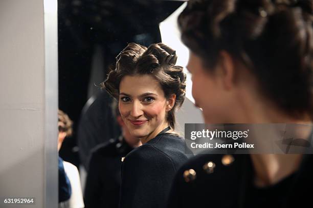 Model is seen backstage ahead of the Sportalm show during the Mercedes-Benz Fashion Week Berlin A/W 2017 at Kaufhaus Jandorf on January 18, 2017 in...