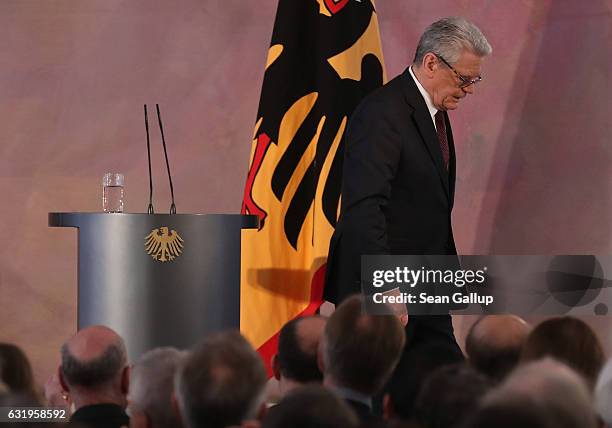 German President Joachim Gauck steps down from the podium aftergiving a speech to mark the end of his term as president at Schloss Bellevue palace on...