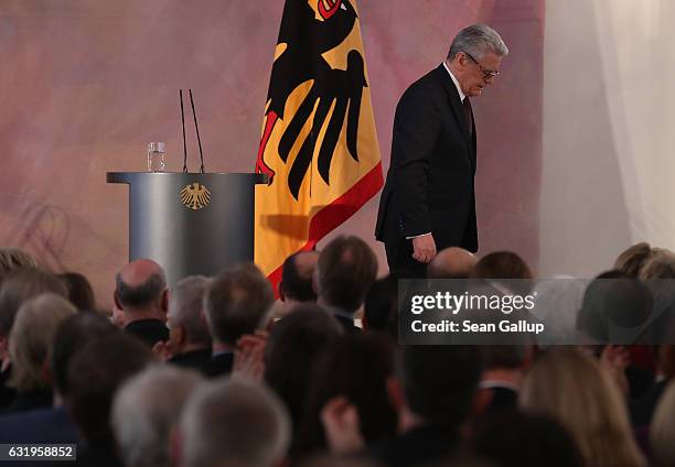 German President Joachim Gauck steps down from the podium aftergiving a speech to mark the end of his term as president at Schloss Bellevue palace on...