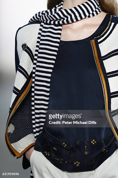 Model, scarf detail, walks the runway at the Sportalm show during the Mercedes-Benz Fashion Week Berlin A/W 2017 at Kaufhaus Jandorf on January 18,...