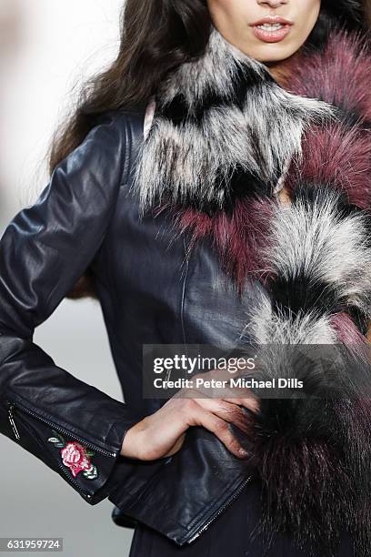 Model, scarf detail, walks the runway at the Sportalm show during the Mercedes-Benz Fashion Week Berlin A/W 2017 at Kaufhaus Jandorf on January 18,...