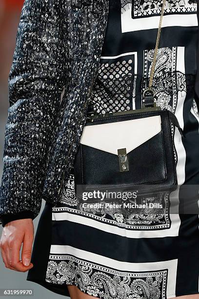 Model, bag detail, walks the runway at the Sportalm show during the Mercedes-Benz Fashion Week Berlin A/W 2017 at Kaufhaus Jandorf on January 18,...