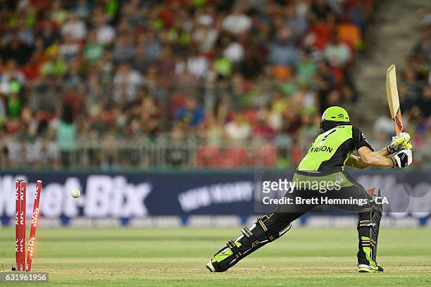Kurtis Patterson of the Thunder is bowled out by Liam O'Connor of the Strikers during the Big Bash League match between the Sydney Thunder and the...