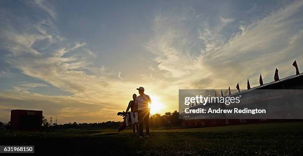 Rickie Fowler of the USA and his caddie Joe Skovron during the Pro Am event prior to the start of the Abu Dhabi HSBC Golf Championship at Abu Dhabi...