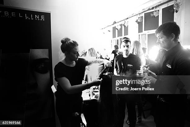 Model is seen backstage ahead of the Sportalm show during the Mercedes-Benz Fashion Week Berlin A/W 2017 at Kaufhaus Jandorf on January 18, 2017 in...