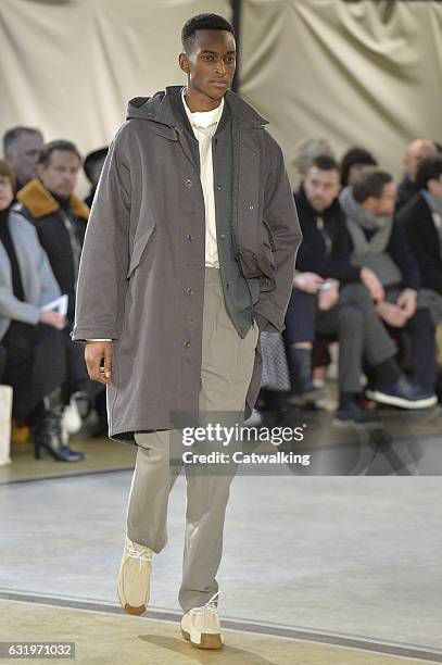 Model walks the runway at the Lemaire Autumn Winter 2017 fashion show during Paris Menswear Fashion Week on January 18, 2017 in Paris, France.