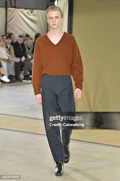 Model walks the runway at the Lemaire Autumn Winter 2017 fashion show during Paris Menswear Fashion Week on January 18, 2017 in Paris, France.