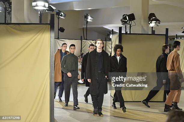 Model walks the runway at the Lemaire Autumn Winter 2017 fashion show during Paris Menswear Fashion Week on January 18, 2017 in Paris, France.