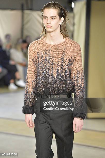 Model walks the runway at the Lemaire Autumn Winter 2017 fashion show during Paris Menswear Fashion Week on January 18, 2017 in Paris, France.