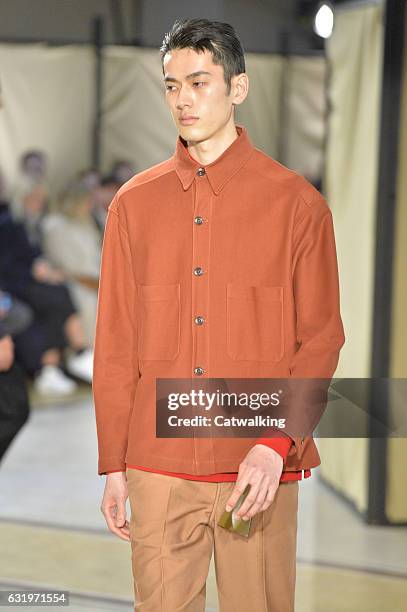 Model walks the runway at the Lemaire Autumn Winter 2017 fashion show during Paris Menswear Fashion Week on January 18, 2017 in Paris, France.