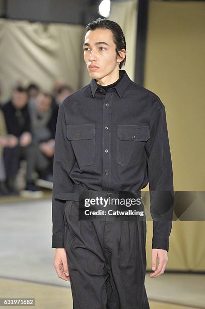 Model walks the runway at the Lemaire Autumn Winter 2017 fashion show during Paris Menswear Fashion Week on January 18, 2017 in Paris, France.