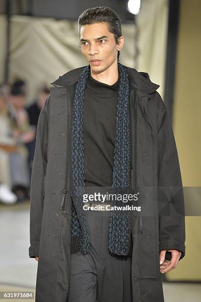 Model walks the runway at the Lemaire Autumn Winter 2017 fashion show during Paris Menswear Fashion Week on January 18, 2017 in Paris, France.